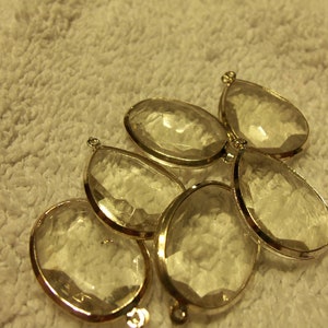 Drop, Blue Moon Beads, acrylic and silver-finished steel, clear, assorted. Pkg of 6.