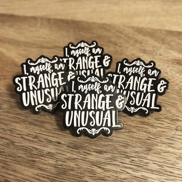 STRANGE and UNUSUAL Lapel Pin