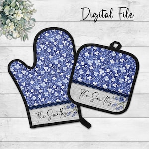May include: A blue floral oven mitt and pot holder set. The set features a blue and white floral pattern with a black trim. The text "The Smiths" is displayed on a grey band. The words "Digital File" are at the top.
