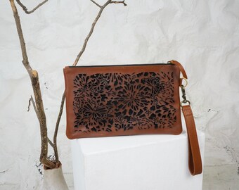 Women's leather clutch, brown cut out pattern leather