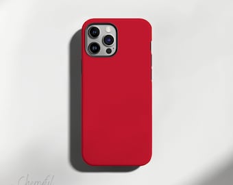 May include: A bright red phone case for an iPhone with a camera bump and a black border.