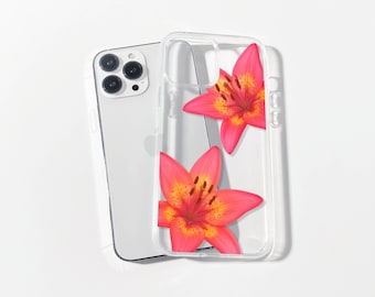 Puede incluir: Funda transparente para teléfono con un diseño floral de dos lirios rosas y amarillos. La funda se muestra junto a un smartphone plateado, creando una estética moderna. Los lirios tienen pétalos detallados.