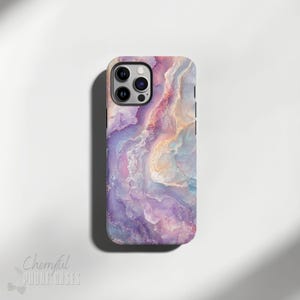 May include: A phone case with a purple, pink, and white marble design. The case has a cutout for the camera lens.
