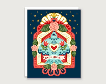 May include: A blue bird with a red heart in its chest is surrounded by flowers and a gold frame. The words "Love & Strength" are written on a banner below the bird.
