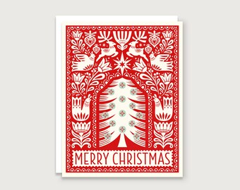 May include: A Christmas card with a red and white folk art design. The card features a Christmas tree, birds, deer, and floral elements. The words "MERRY CHRISTMAS" are printed at the bottom of the card.