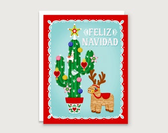 May include: A festive Christmas card featuring a decorated cactus with ornaments, a star tree topper, and a piñata reindeer. The card has a red border and the words "Feliz Navidad" in white.