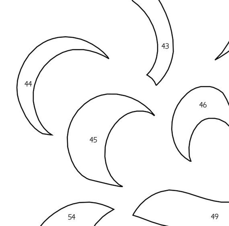 May include: A collection of black outline shapes, including crescent moons and curved lines, against a white background. The shapes are numbered, with the largest being a crescent moon labeled "44".