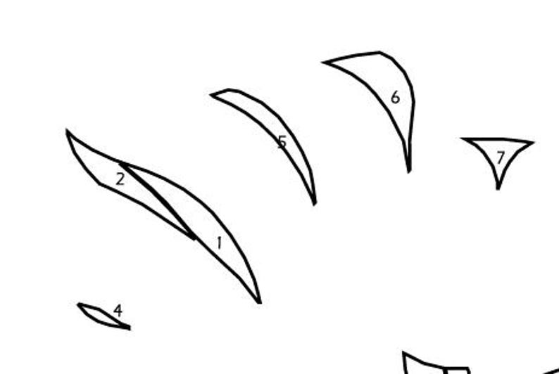 May include: A collection of abstract black line art shapes on a white background. The shapes include curved lines, leaf-like forms, and a small triangle. The design is simple and graphic, suitable for various applications.