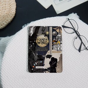 May include: A rectangular e-reader cover featuring a Fourth Wing collage design with black, gold, and cream tones. It displays a dragon, a silhouette of a couple, architectural elements, and text including "Fourth Wing" and "I will not die today."
