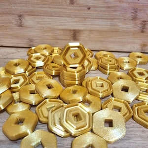 Roblox shiny Robux Coins in various colours