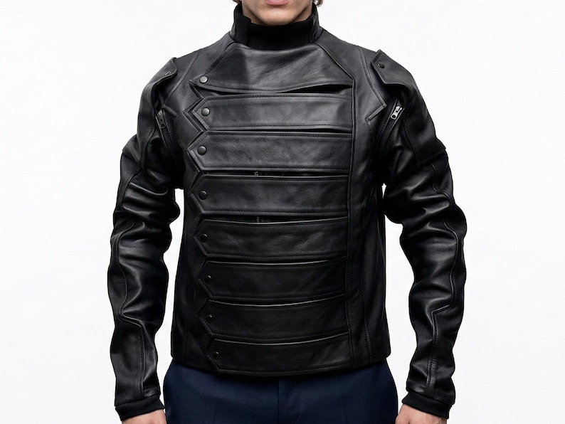 May include: A black leather jacket with a high collar and multiple horizontal panels across the chest. The jacket features a unique design with button and zipper details, and fitted sleeves. The garment is a stylish piece of outerwear.