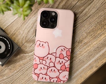 May include: A pink phone case with a design of multiple pink cartoon characters with white stars on a pink background. The phone case has a camera lens cutout.