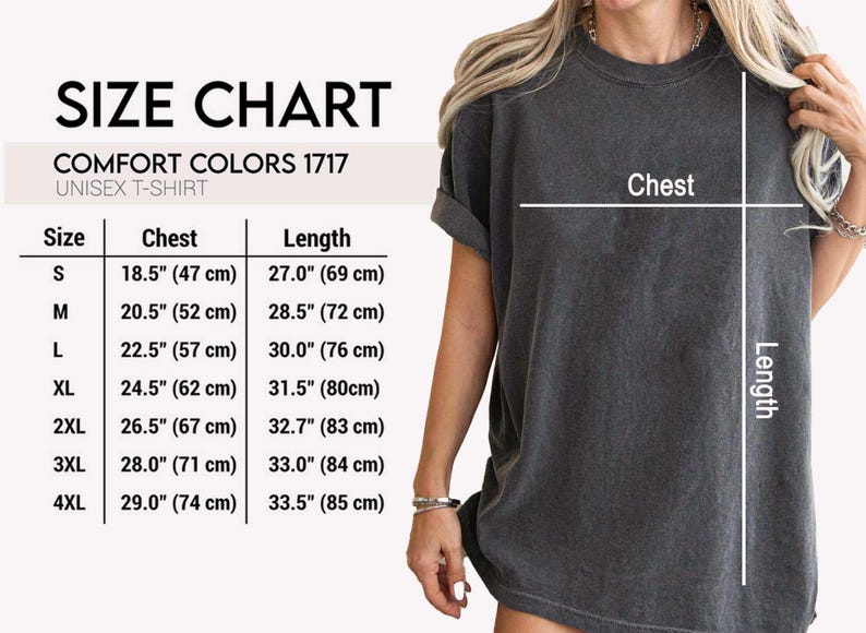 May include: Size chart for a unisex t-shirt, with chest and length measurements in inches and centimeters. The chart includes sizes S, M, L, XL, 2XL, 3XL, and 4XL. The model is wearing a dark gray t-shirt.