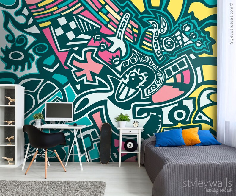 May include: A teal, pink, yellow and white abstract geometric pattern mural with a black and white chequered pattern. The mural is in a room with a desk, chair and a bed.