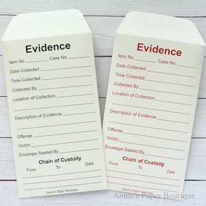 May include: Two off-white paper envelopes for evidence collection. The left envelope features black text reading Evidence, Item No., Case No., Date, Time, Collected By, Location, Description, Offense, Victim, Envelope Sealed By, and Chain of Custody.