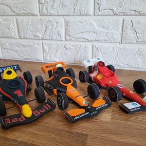 Edible F1 style racing car, cake topper decoration fully customisable any formula one team