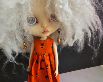 Black cat with pumpkin