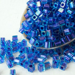 4mm Miyuki Cube Beads - Color Lined Cube Beads - Square Beads For Bead Weaving - 4mm Purple Lined Aqua - 20 grams