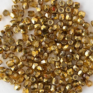 50 - 2mm Firepolished Beads - Czech Glass Beads - Crystal Apricot Metallic - 50 beads