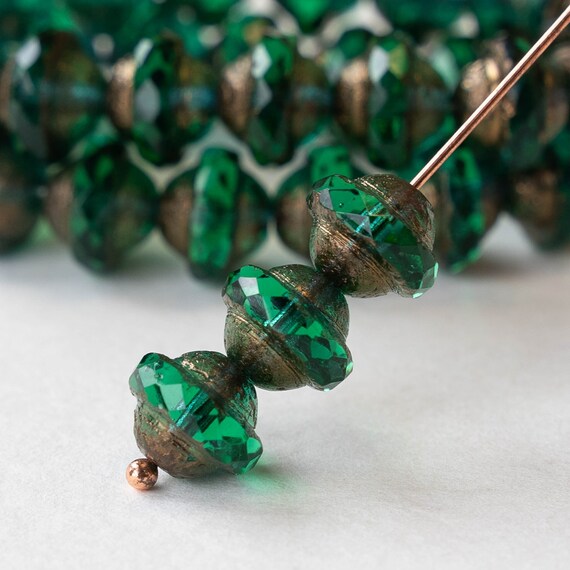15 8x10mm Saturn Beads Czech Glass Beads Emerald Green With Bronze 15 Beads Etsy Canada