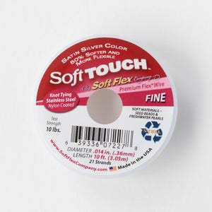 May include: A spool of Soft Touch fine beading wire in silver. The spool has a red and white label with text including "Knot Tying", "Stainless Steel", and "10 lbs. test strength". The diameter is .014 in. and the length is 10 ft.
