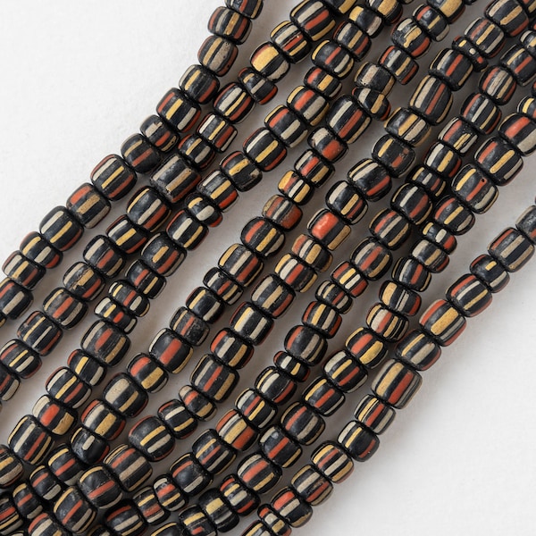 African Trade Beads From Java - Black with Orange Yellow and White Stripes - 10 Inch Strand