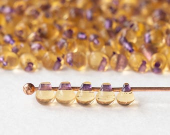 3.4mm Glass Magatama Teardrops - Japanese Glass Beads - Purple Lined Amber - 10 or 20 grams