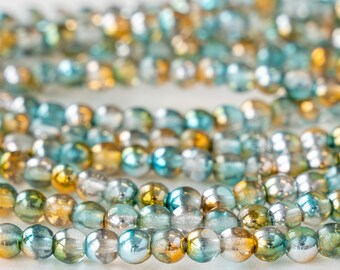 white 7 x 4 mm 40 bohemian glass beads drops light blue