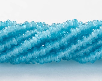 Rustic Indonesian Glass Abon Beads - Aqua Blue - Whole or Half Strand