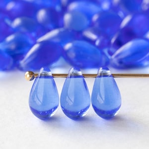 50 - 6x9mm Glass Teardrop Beads - Czech Glass Beads - Transparent Sapphire Blue -  50 beads
