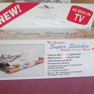 1992 SUPER STITCHER Portable Cordless Sewing Machine with original box and instructions.