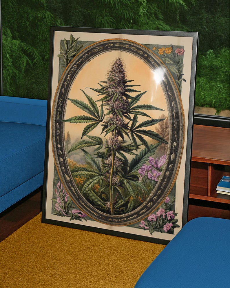 May include: Framed botanical print featuring a cannabis plant within an oval frame. The artwork showcases a detailed illustration of the plant with green leaves and purple buds, surrounded by floral elements. The frame is black, and the background is a warm, neutral tone.