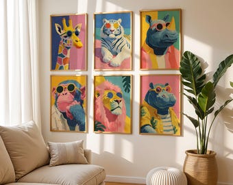 May include: Six framed art prints featuring anthropomorphic animals wearing sunglasses. The animals include a giraffe, tiger, rhino, monkey, lion, and hippo. Each print has a colorful background and a gold frame, creating a fun and stylish wall art set.