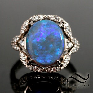 5 ct Australian semi black crystal Opal ring in 14k white gold