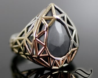 The Ember Ring - Hand cut black moissanite in 14k rose and yellow gold and sterling silver