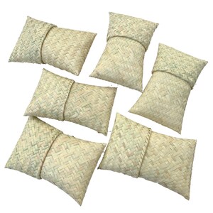 May include: Six woven straw pouches, each with a folded top, arranged in a scattered pattern on a white background.