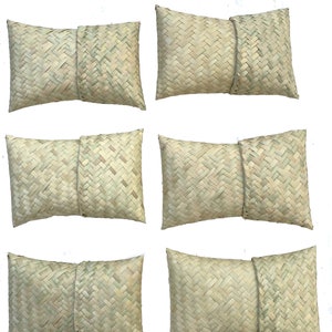 May include: Six woven straw pillows, each with a light beige color and a woven pattern. The pillows are arranged in two rows of three.