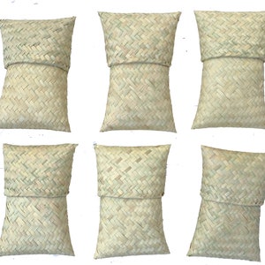 May include: Six woven natural-colored pillows with a diamond pattern. The pillows are made of a natural material, possibly straw or bamboo.