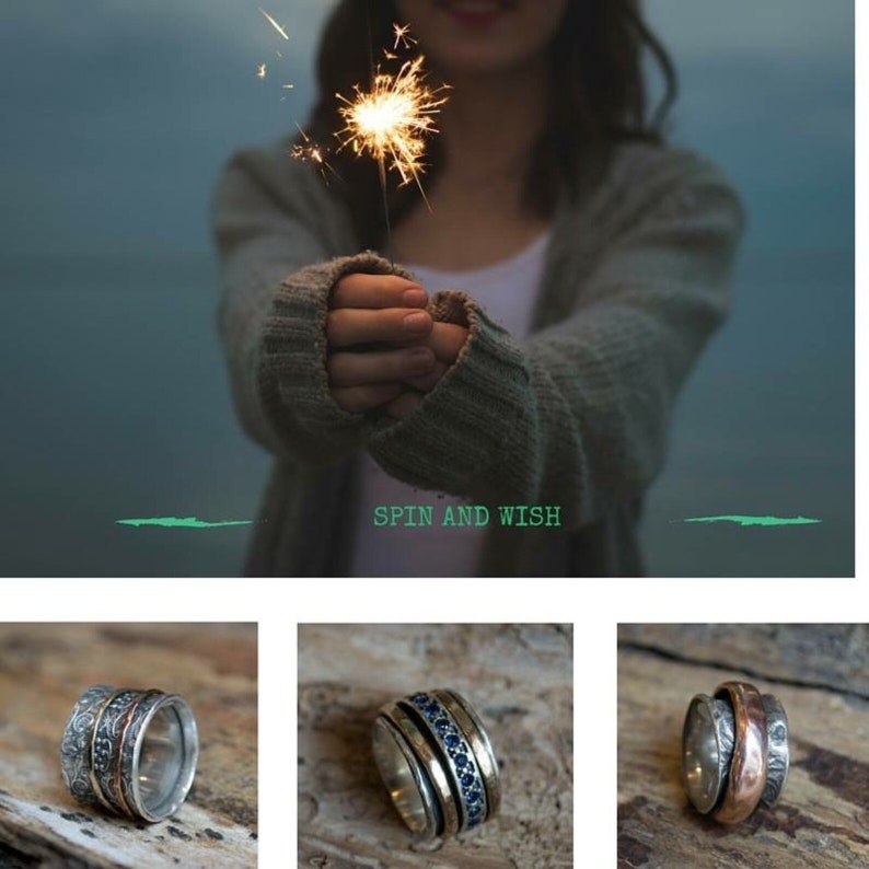 May include: Three silver spinning rings with different designs. The first ring has a floral pattern, the second ring has blue gemstones, and the third ring has a hammered texture. The rings are on a wooden surface. "Spin and Wish" is written below the rings.
