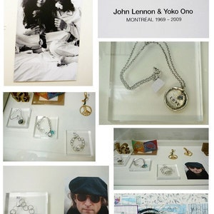 May include: A black and white photo of John Lennon and Yoko Ono, a silver chain necklace with a silver charm that says "LOVE" in all caps, a collection of silver bracelets and charms, a photo of John Lennon wearing a black cap and sunglasses, and a map with a blue eye drawn on it.