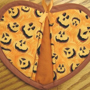 Jack O&#39;Lantern Pumpkin Faces on Orange