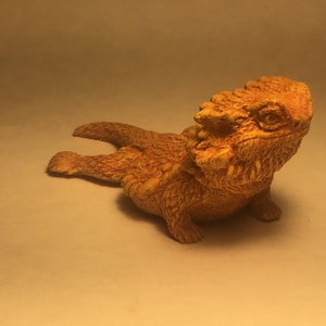 Bearded Dragon sculpture figurine “Relaxing Cutie” terra cotta finish