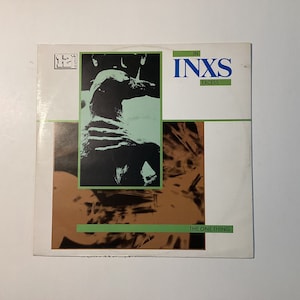 Inxs &quot;In Inxs Excess&quot; 12” vinyl single The One Thing w/ Black and White