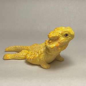 Bearded Dragon sculpture figurine “Relaxing Cutie” yellow orange finish