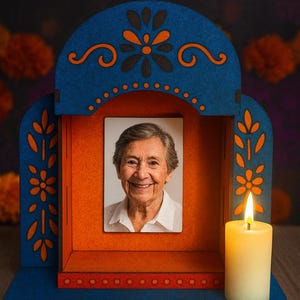 May include: A blue, orange, and red digital design of a Day of the Dead altar with a photo of a smiling woman. The altar has floral and scroll designs, a lit candle, and the text "DIGITAL DIGITAL" and "DXF • AI • PDF • SVG".