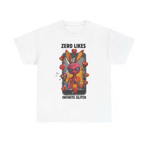 Puede incluir: Camiseta blanca con un diseño de conejo de dibujos animados. El conejo rosa con ojos azules está rodeado de corazones rojos. El diseño incluye un gráfico de smartphone y los textos "ZERO LIKES" e "INFINITE GLITCH" impresos.