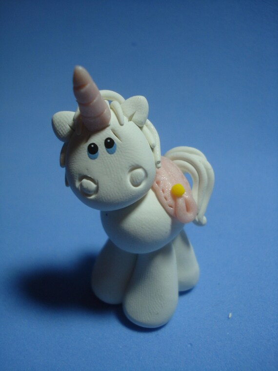 Items similar to Unicorn Clay Figurine on Etsy