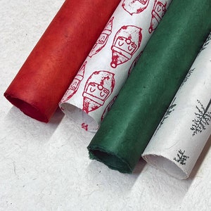 Mixed Holiday Colors set of four handmade Wrapping Paper gift wrap: Santa, Green Trees, Solid Red, Solid Green - Handmade Seed Paper