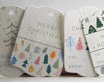 May include: Set of six Christmas gift tags with a variety of designs featuring trees, stars, and the words "Merry Christmas" and "Happy Holidays". The tags are made of recycled paper and have a rustic, handmade look.
