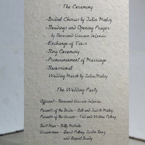 May include: A wedding announcement for Jill Maloy and Daniel Polkey. The ceremony and wedding party details are listed, including the officiant, parents of the bride and groom, best man, groomsmen, maid of honor, bridesmaids, flower girls, and ring bearer.